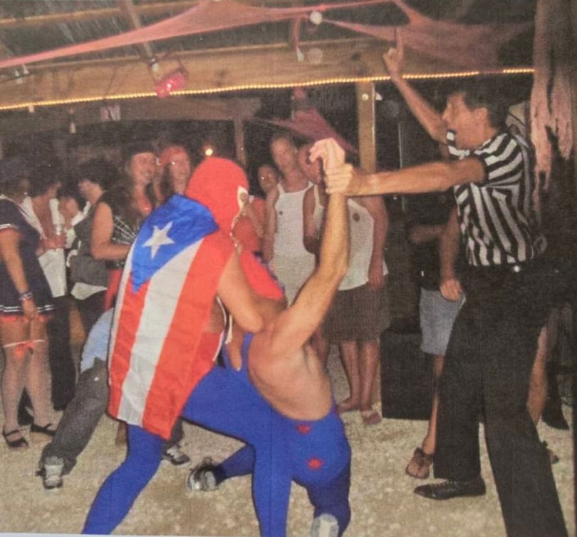 Jimmy refereeing a wrestling match